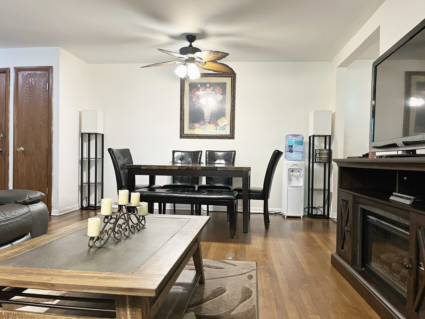 736 Dempster Street, Unit 110 Mount Prospect, IL 60056 - Photo 6 of 20 a view of a dining room with furniture and wooden floor