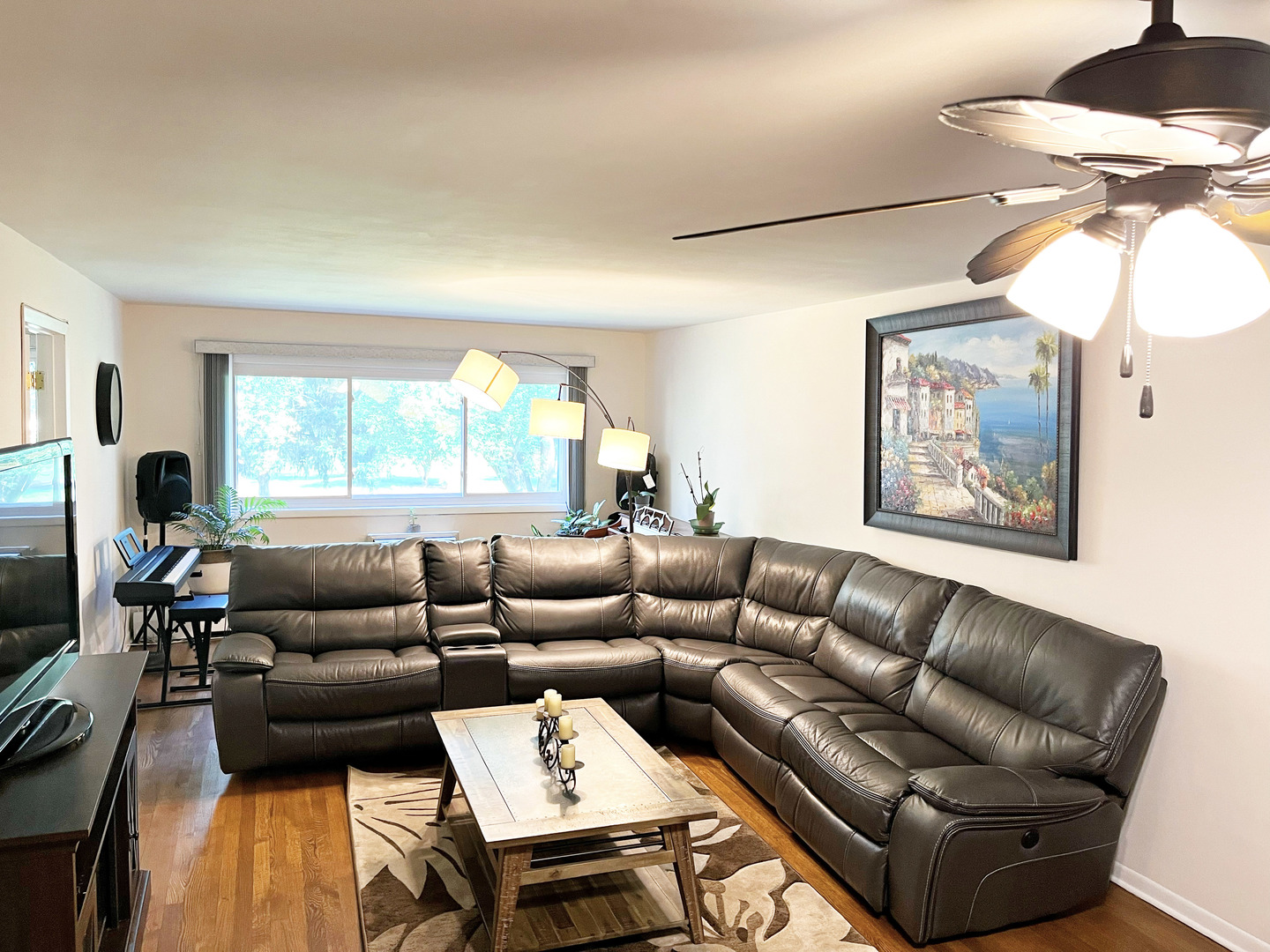 736 Dempster Street, Unit 110 Mount Prospect, IL 60056 - Photo 7 of 20 a living room with furniture and a window