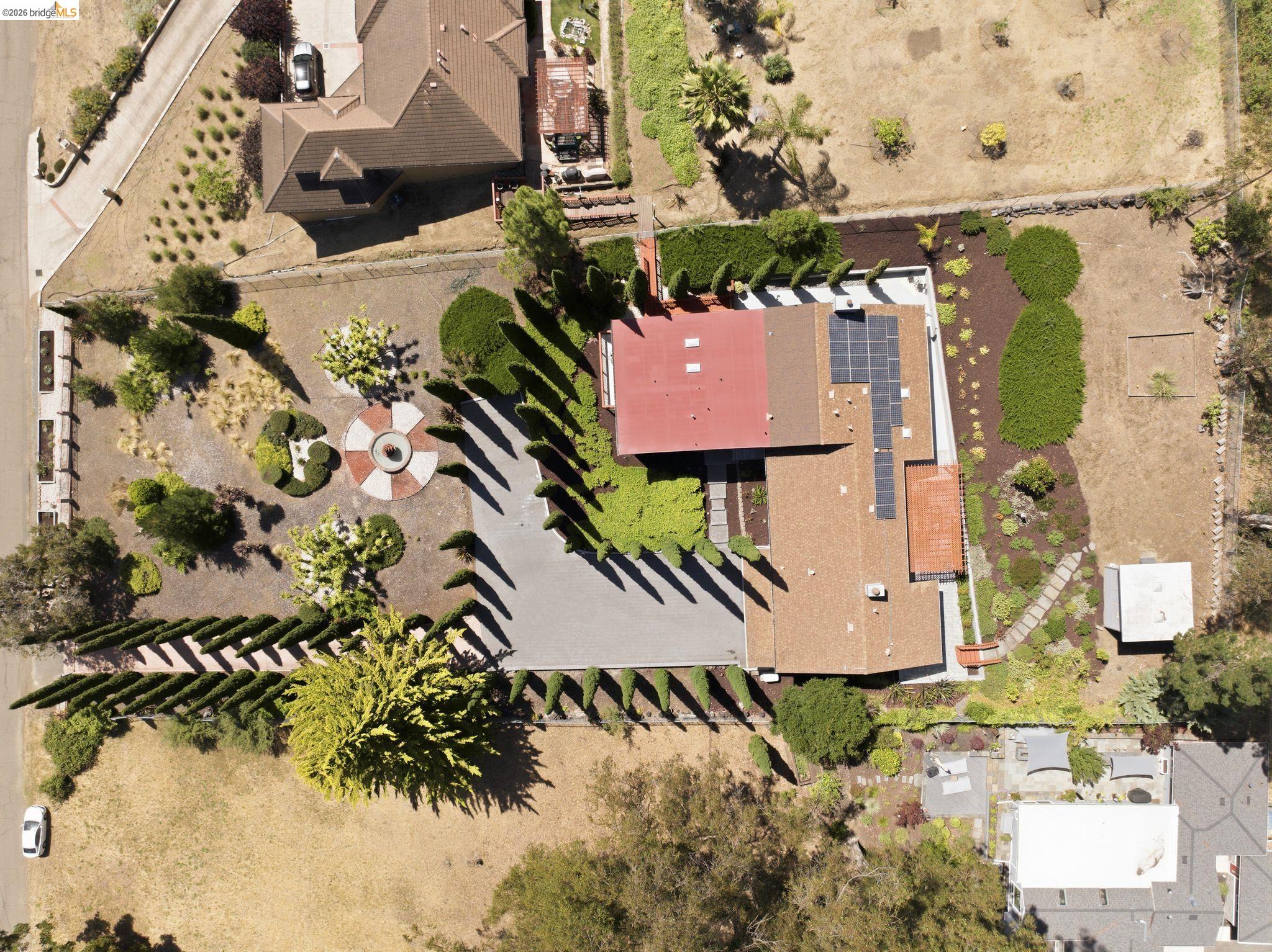 11133 Golf Links Road Oakland, CA 94605 - Photo 57 of 57 Expansive property featuring a large residence, a paved driveway, and multiple landscaped areas