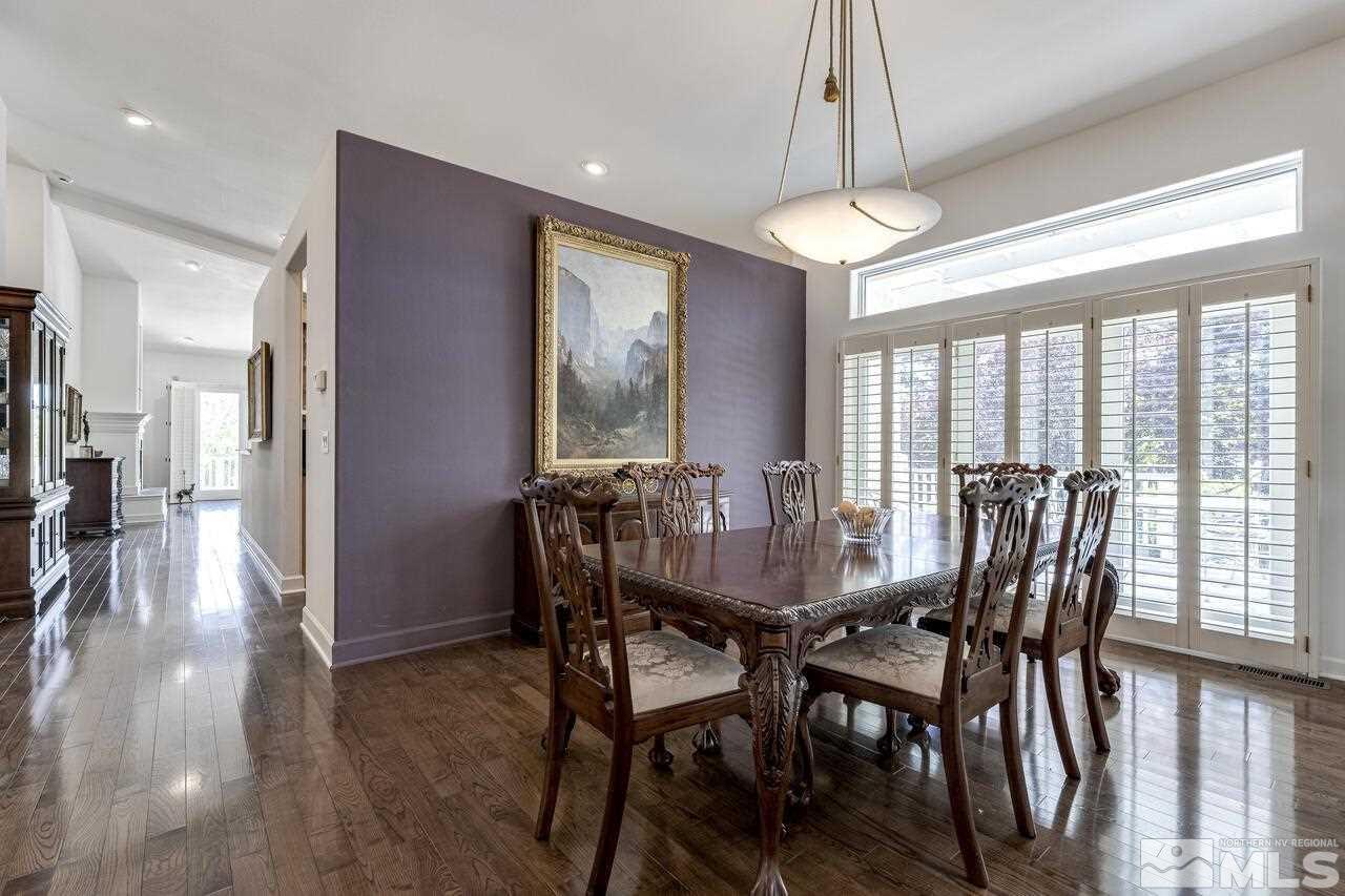 4370 Juniper Trail Reno, NV 89519 - Photo 11 of 40 a view of a dining room with furniture window and wooden floor