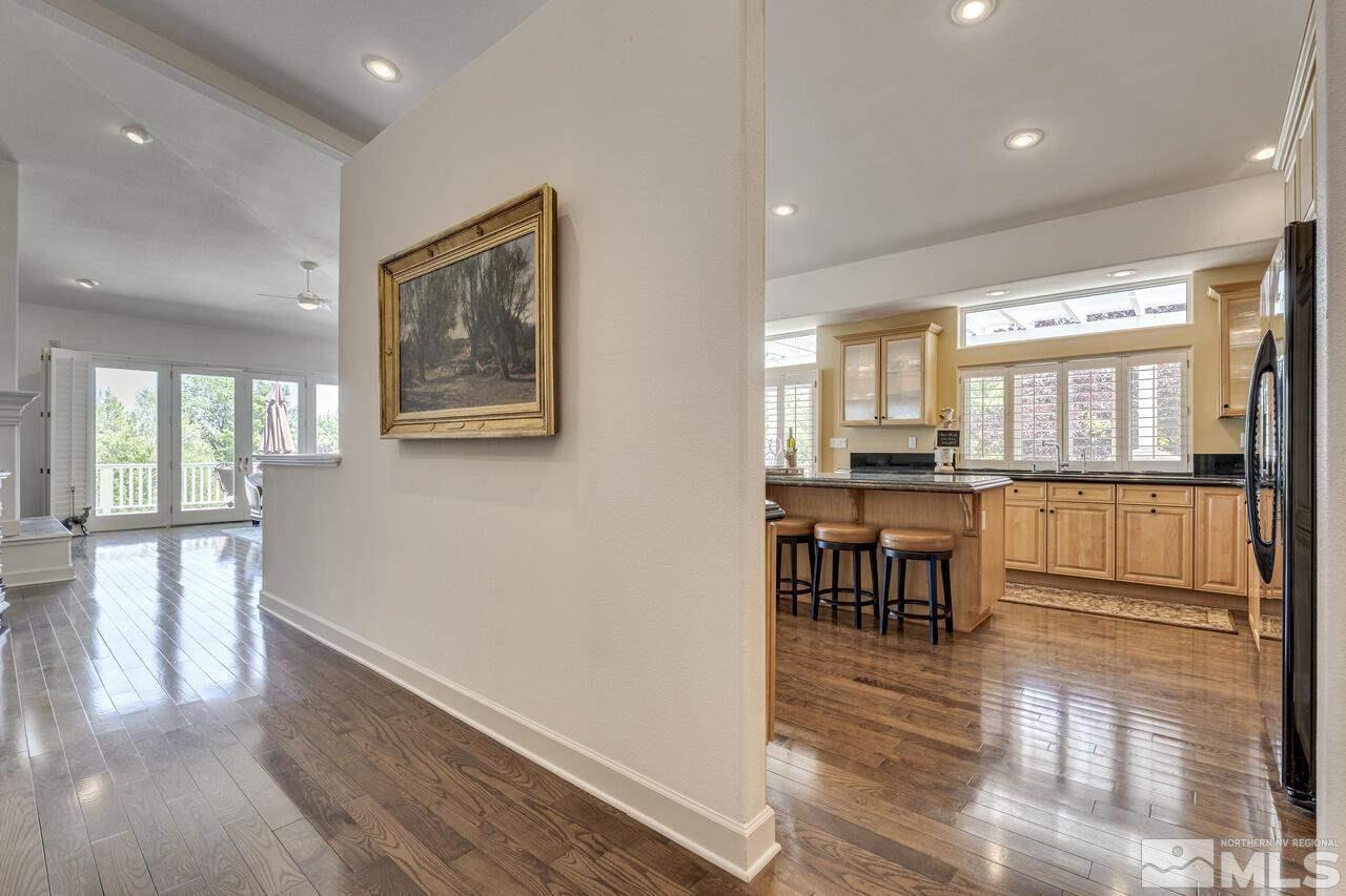 4370 Juniper Trail Reno, NV 89519 - Photo 12 of 40 a view of a kitchen with furniture and wooden floor