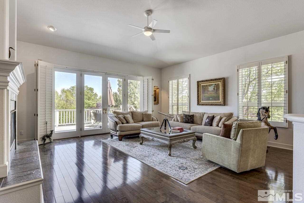 4370 Juniper Trail Reno, NV 89519 - Photo 18 of 40 a living room with furniture and a large window