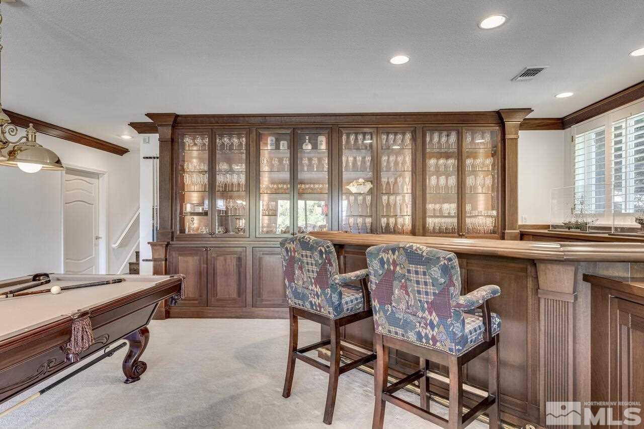 4370 Juniper Trail Reno, NV 89519 - Photo 30 of 40 a dining room with a window and wooden floor