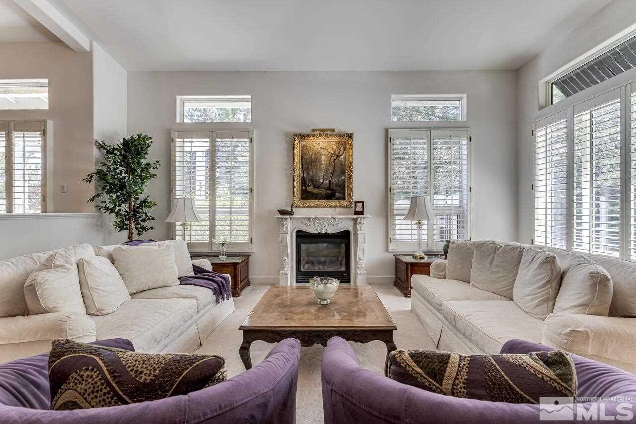 4370 Juniper Trail Reno, NV 89519 - Photo 9 of 40 a living room with furniture and a fireplace