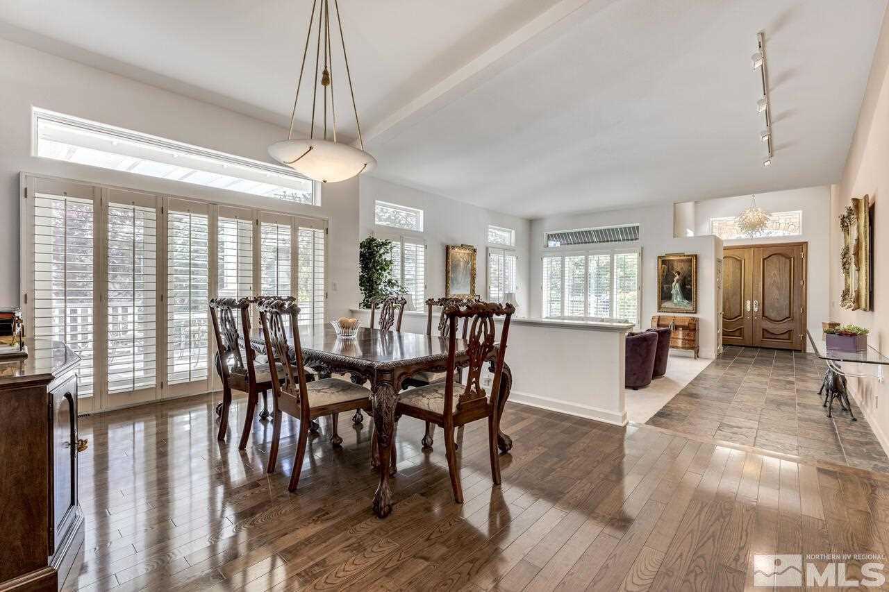 4370 Juniper Trail Reno, NV 89519 - Photo 10 of 40 a view of a dining room with furniture window and wooden floor