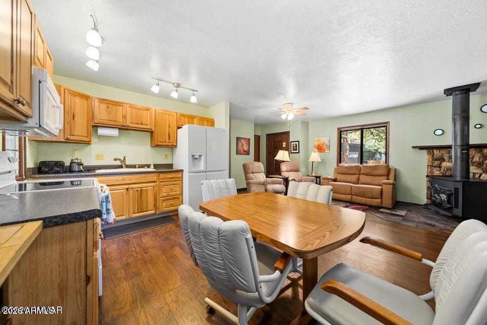 5801 Apache Trail Pinetop, AZ 85935 - Photo 13 of 39 a living room with stainless steel appliances kitchen island furniture and a kitchen view