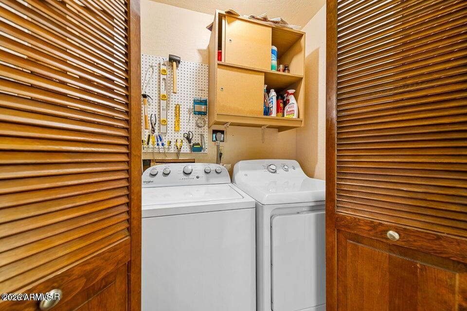 5801 Apache Trail Pinetop, AZ 85935 - Photo 23 of 39 a utility room with dryer and washer