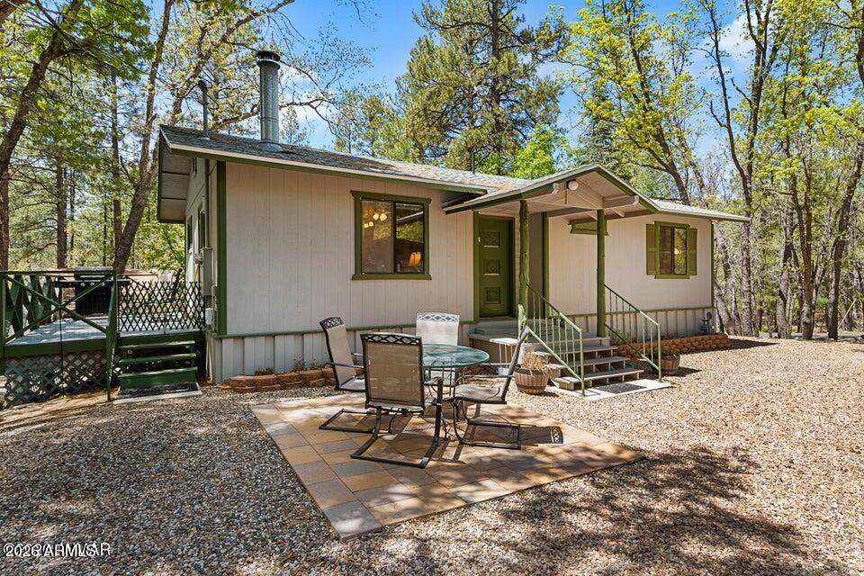 5801 Apache Trail Pinetop, AZ 85935 - Photo 6 of 39 a view of a house with backyard and sitting area