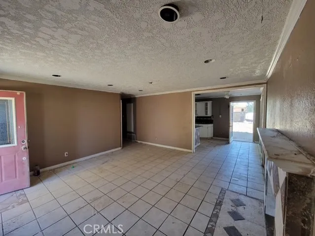 a view of livingroom with kitchen
