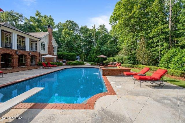 7959 Whittle Road Macon, GA 31220 - Photo 12 of 49 a backyard of a house with outdoor seating