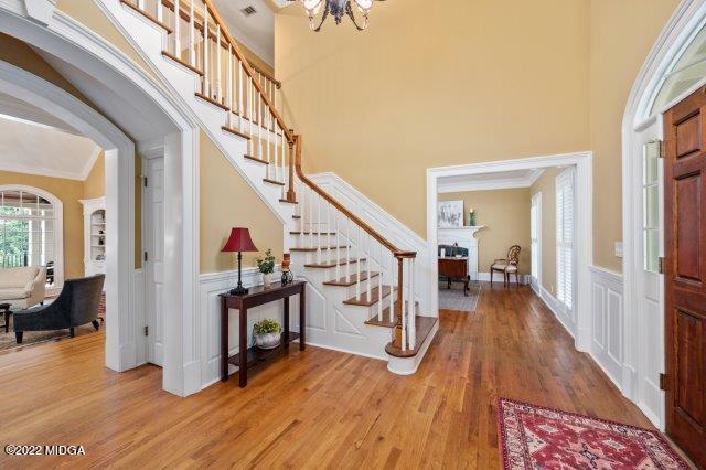 7959 Whittle Road Macon, GA 31220 - Photo 14 of 49 a view of entryway with wooden floor and stairs