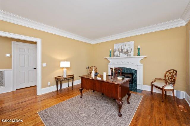 7959 Whittle Road Macon, GA 31220 - Photo 16 of 49 a living room with furniture and a fireplace