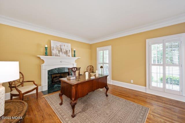 7959 Whittle Road Macon, GA 31220 - Photo 17 of 49 a living room with furniture and a fireplace