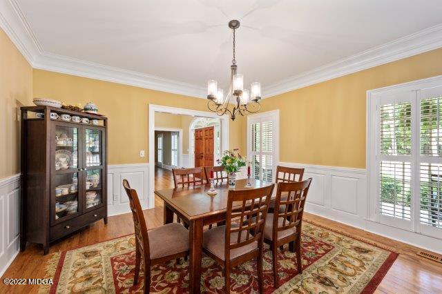 7959 Whittle Road Macon, GA 31220 - Photo 19 of 49 a view of a dining room with furniture window and wooden floor