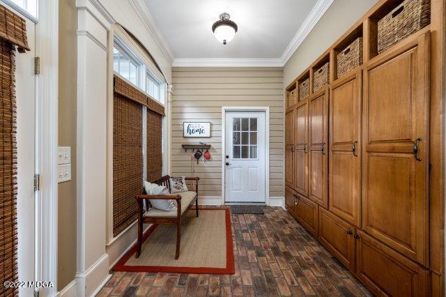 7959 Whittle Road Macon, GA 31220 - Photo 35 of 49 a view of a hallway with bathroom and wooden floor
