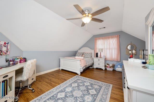 7959 Whittle Road Macon, GA 31220 - Photo 42 of 49 a living room with a baby crib furniture and a chandelier