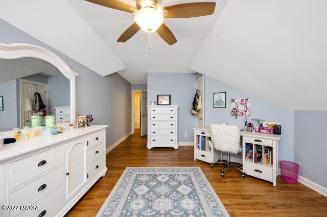 7959 Whittle Road Macon, GA 31220 - Photo 43 of 49 a room with furniture a chandelier and a rug