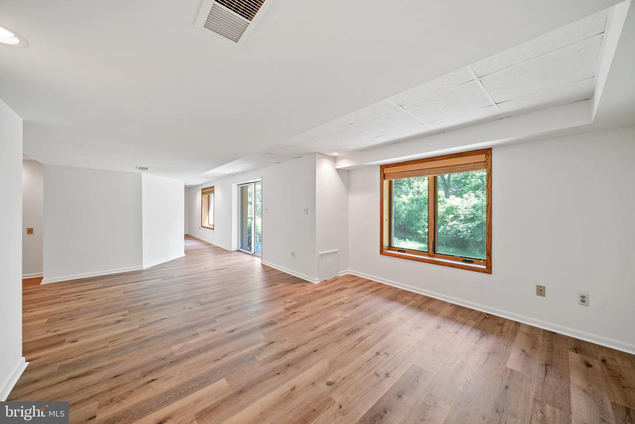 1007 Saber Road West Chester, PA 19382 - Photo 44 of 49 Walkout level basement with new flooring