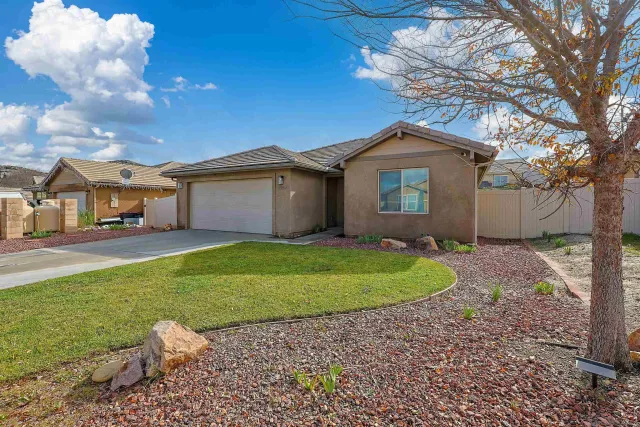a house view with a garden space