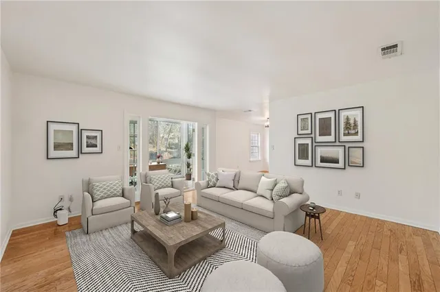 a living room with furniture and a couch