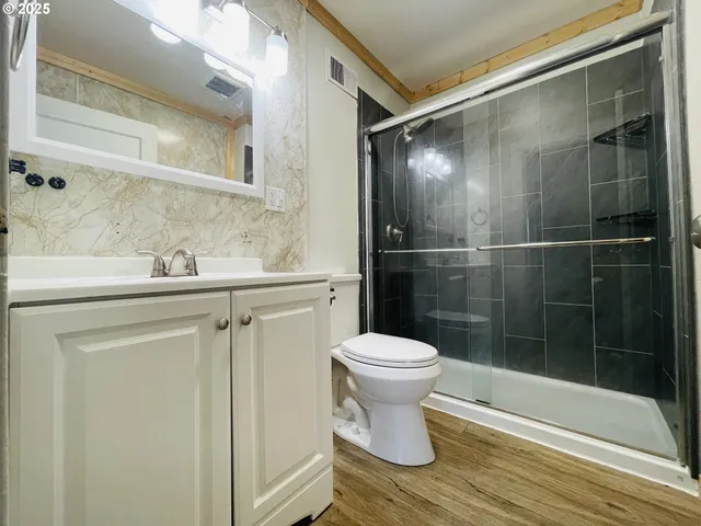 a bathroom with a sink and a toilet