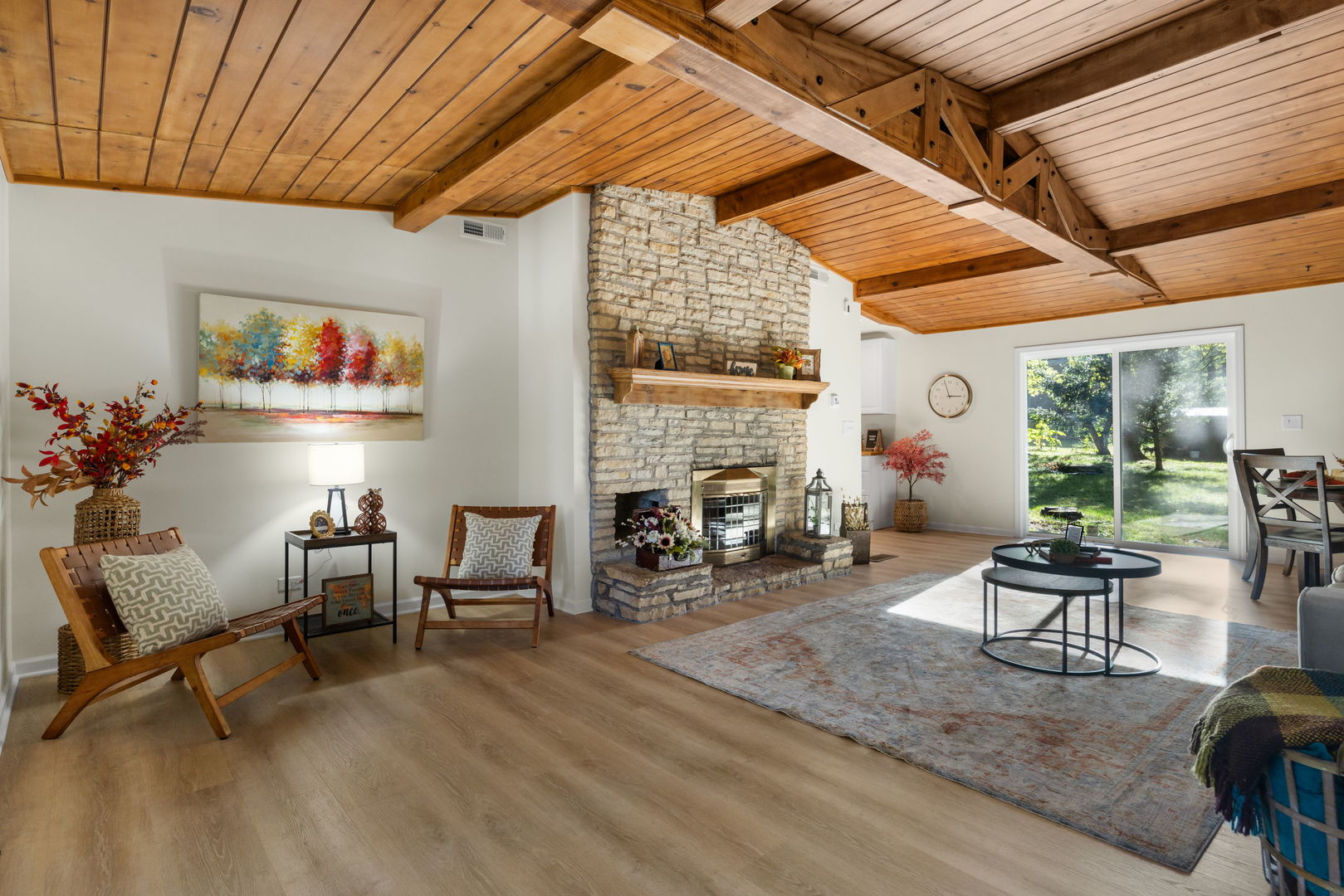 275 Indian Trail Lake In The Hills, IL 60156 - Photo 13 of 25 a living room with furniture a fireplace and a table