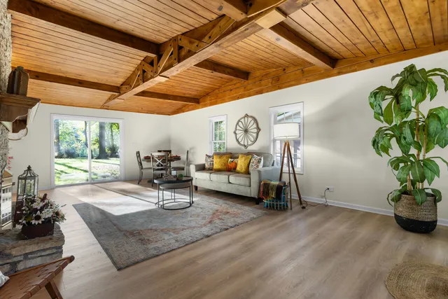 a room with furniture and gym equipment