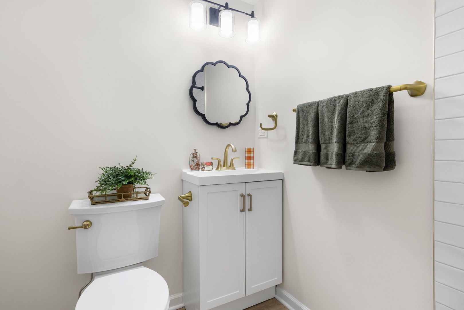 275 Indian Trail Lake In The Hills, IL 60156 - Photo 21 of 25 a bathroom with a toilet a sink and a mirror