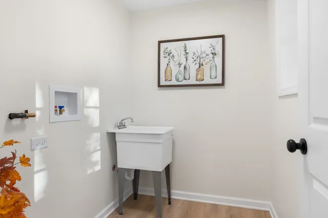 a kitchen with stainless steel appliances granite countertop a refrigerator and a stove