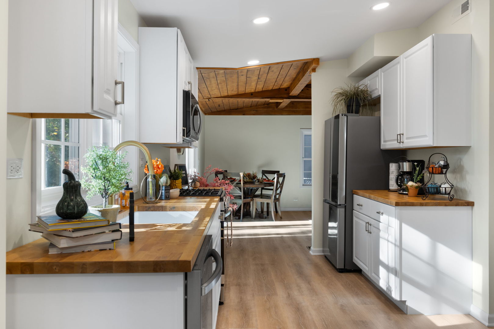 275 Indian Trail Lake In The Hills, IL 60156 - Photo 7 of 25 a kitchen with stainless steel appliances granite countertop a refrigerator and a sink