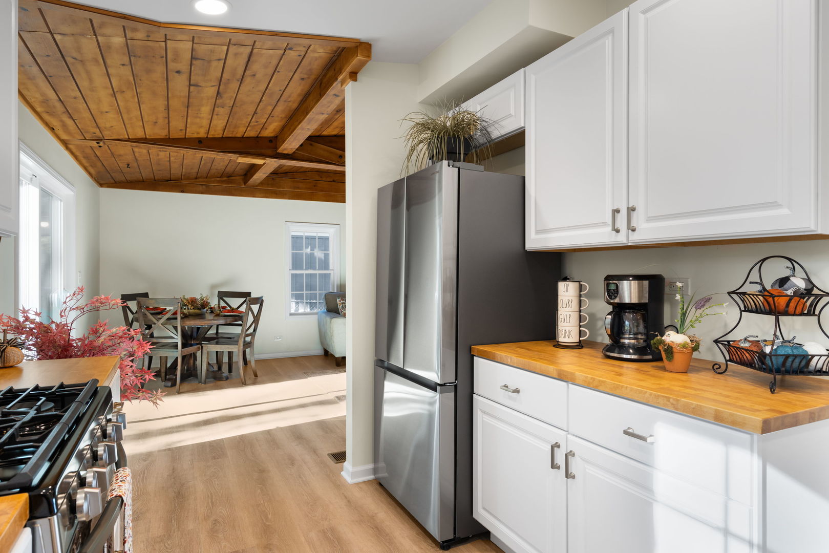 275 Indian Trail Lake In The Hills, IL 60156 - Photo 10 of 25 a kitchen with stainless steel appliances granite countertop a refrigerator and a sink