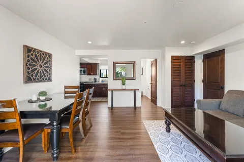a kitchen with a sink and a microwave