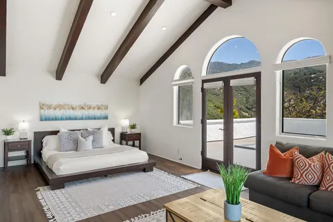 a view of balcony with furniture