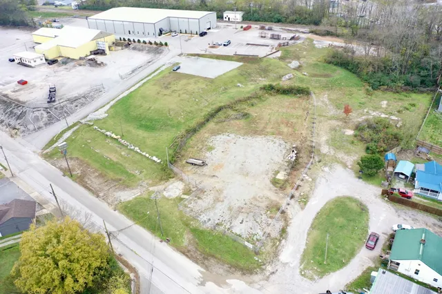 a view of swimming pool with a yard and seating area