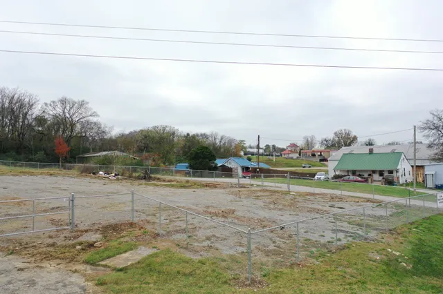 a view of a yard with an outdoor space
