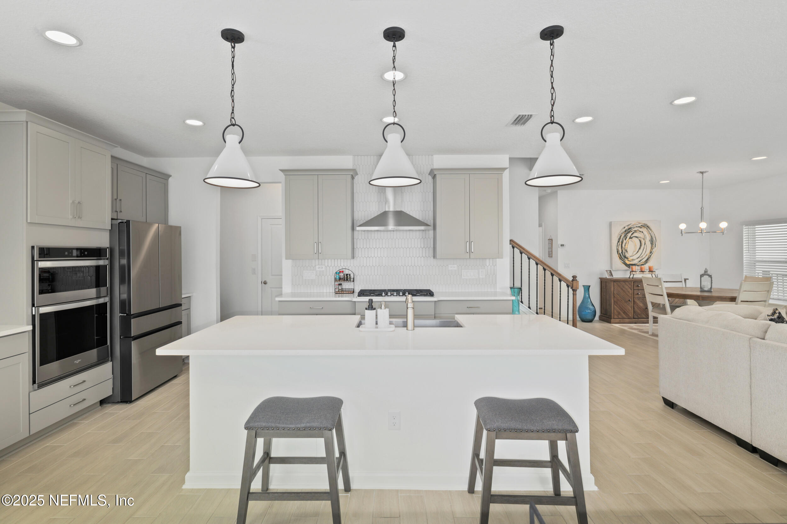 219 Goldcrest Way St. Augustine, FL 32092 - Photo 16 of 55 a large kitchen with a table and chairs