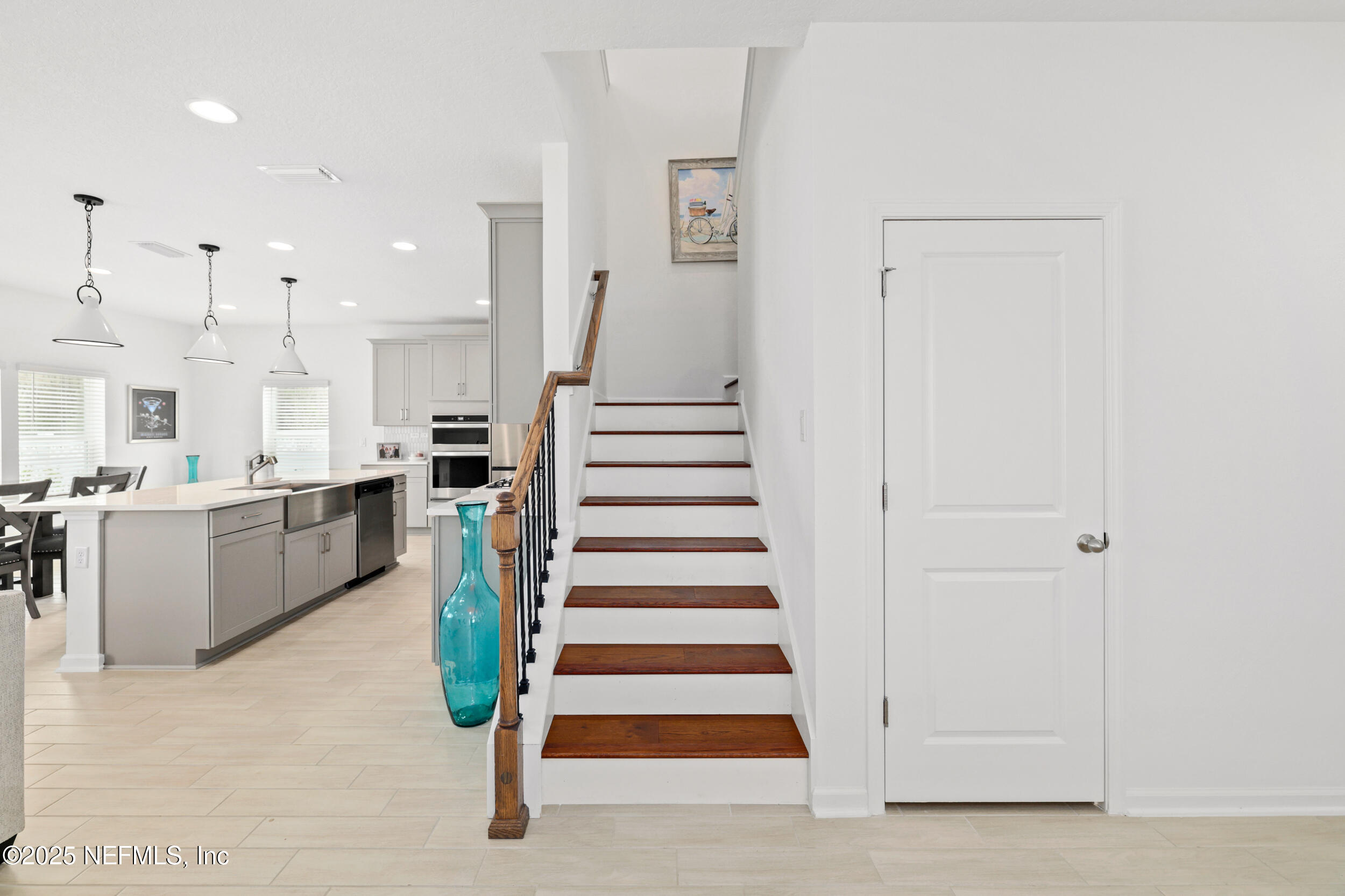219 Goldcrest Way St. Augustine, FL 32092 - Photo 23 of 55 a view of a kitchen with furniture and wooden floor