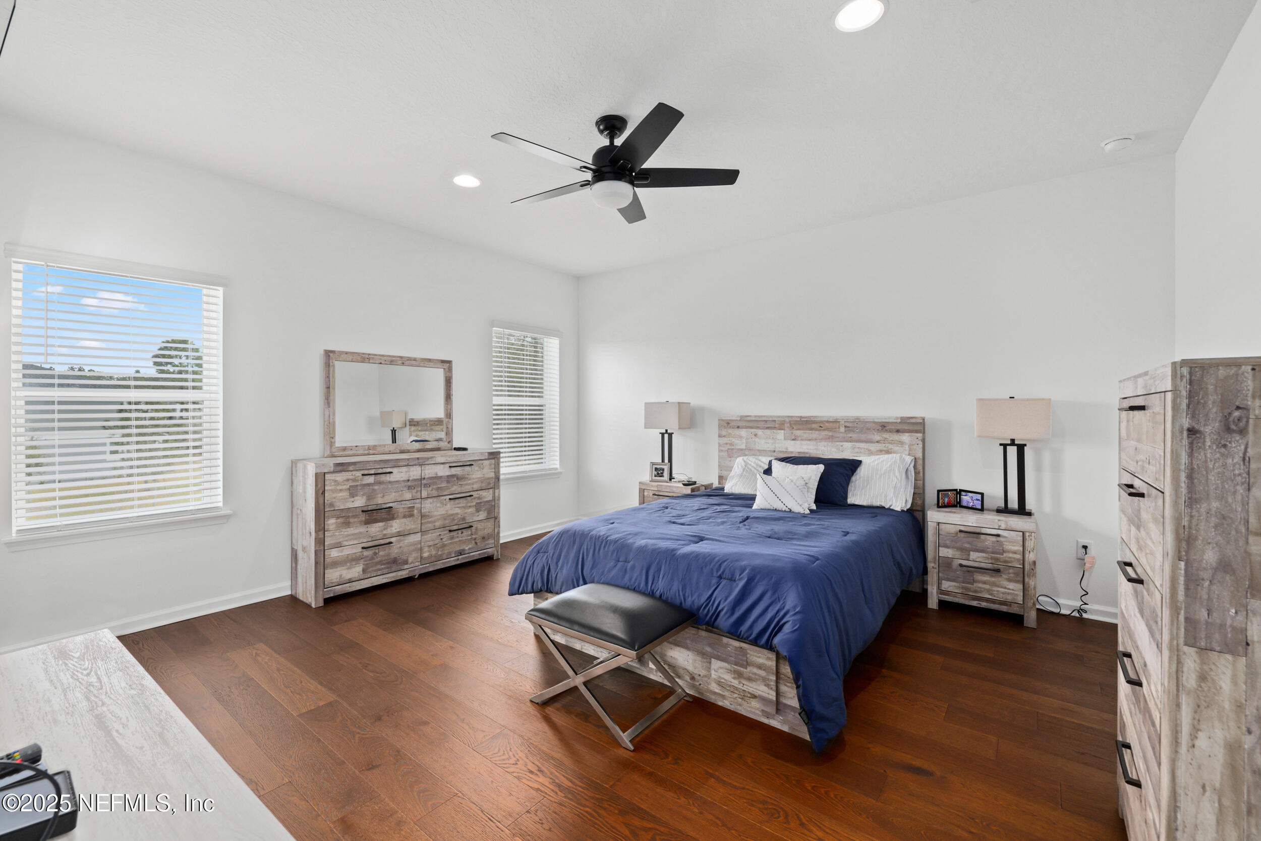 219 Goldcrest Way St. Augustine, FL 32092 - Photo 25 of 55 a living room with a bed furniture and a window