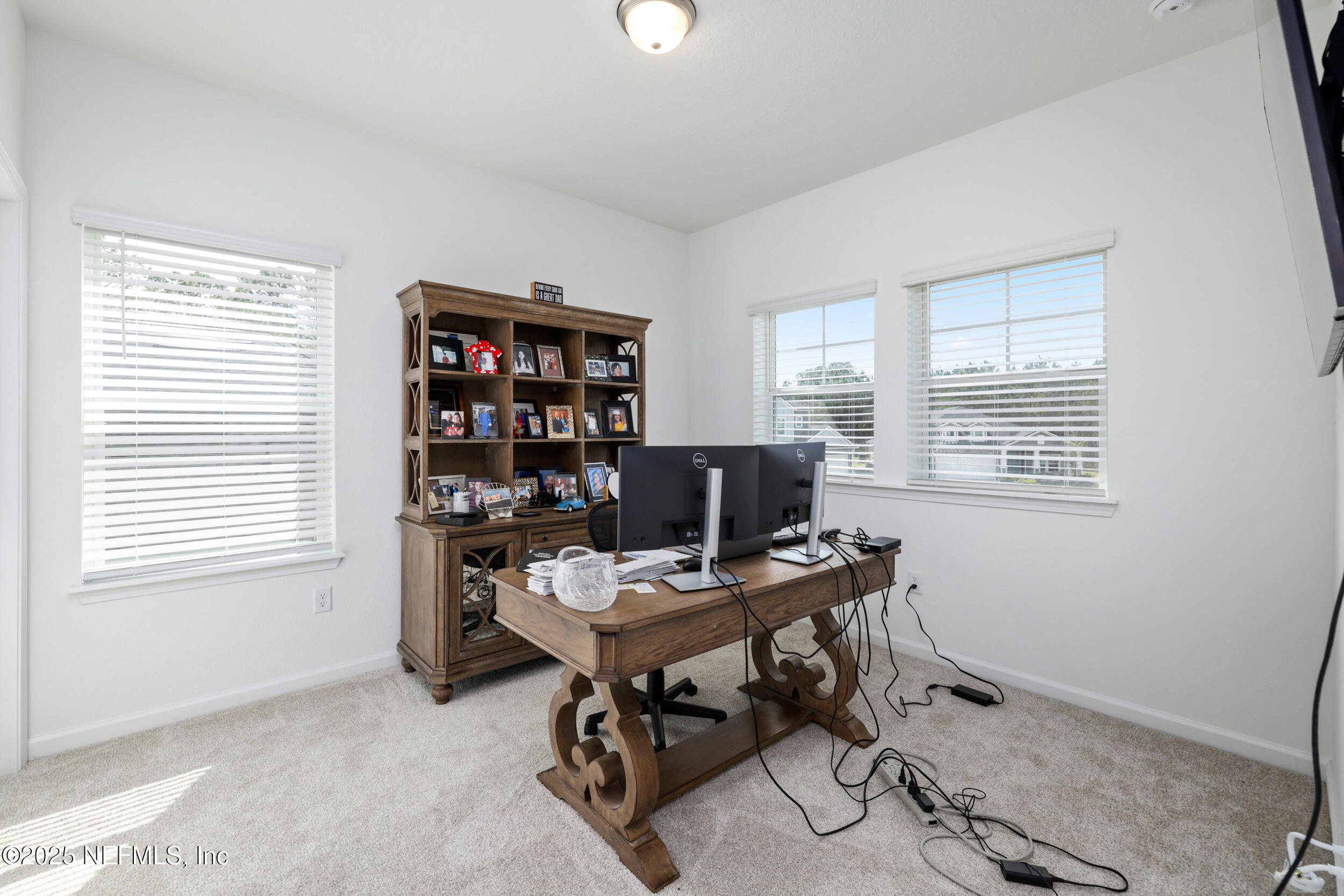 219 Goldcrest Way St. Augustine, FL 32092 - Photo 32 of 55 a view of a workspace with a window and shelf