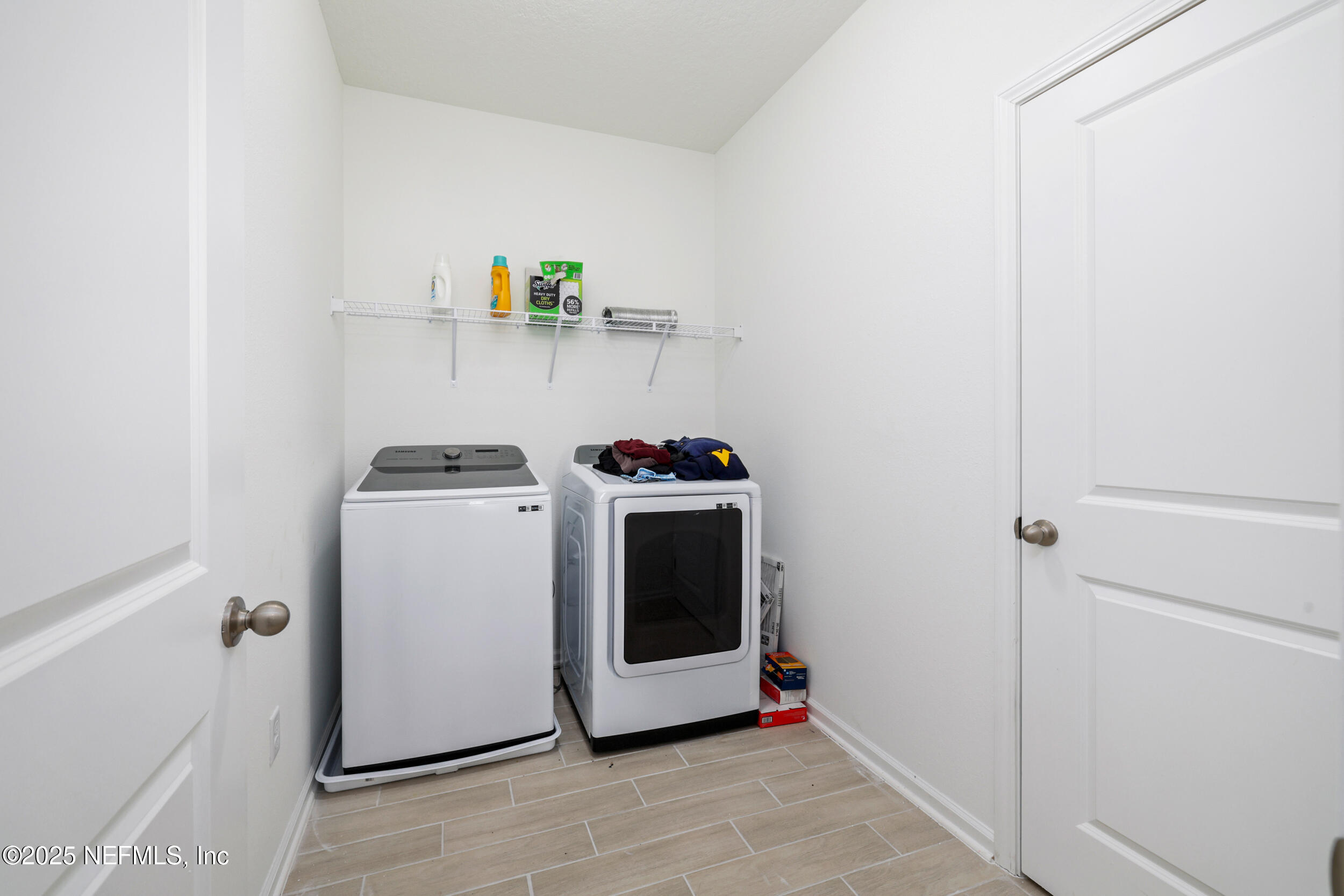 219 Goldcrest Way St. Augustine, FL 32092 - Photo 33 of 55 a utility room with dryer and washer