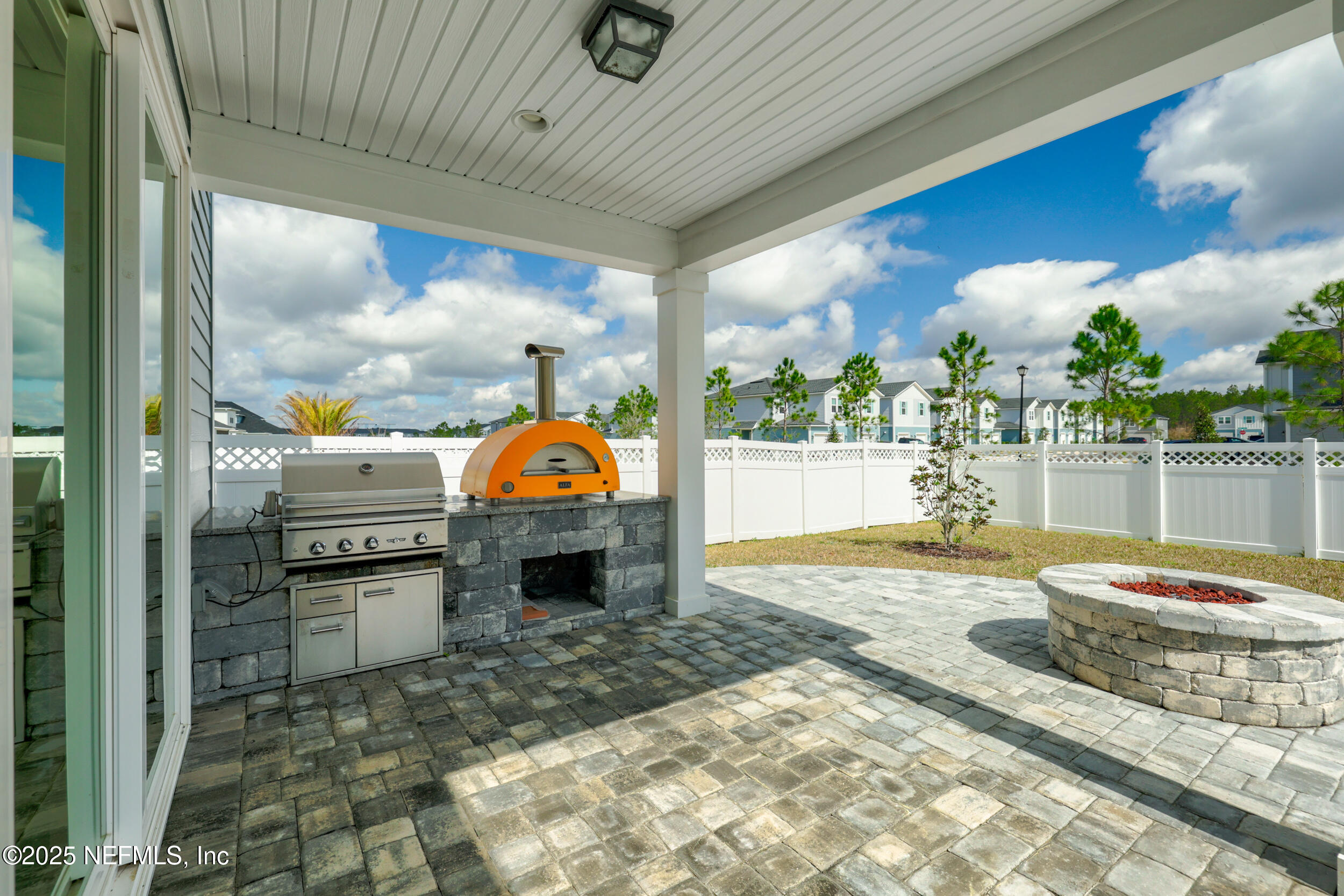 219 Goldcrest Way St. Augustine, FL 32092 - Photo 34 of 55 a view of a living room and kitchen