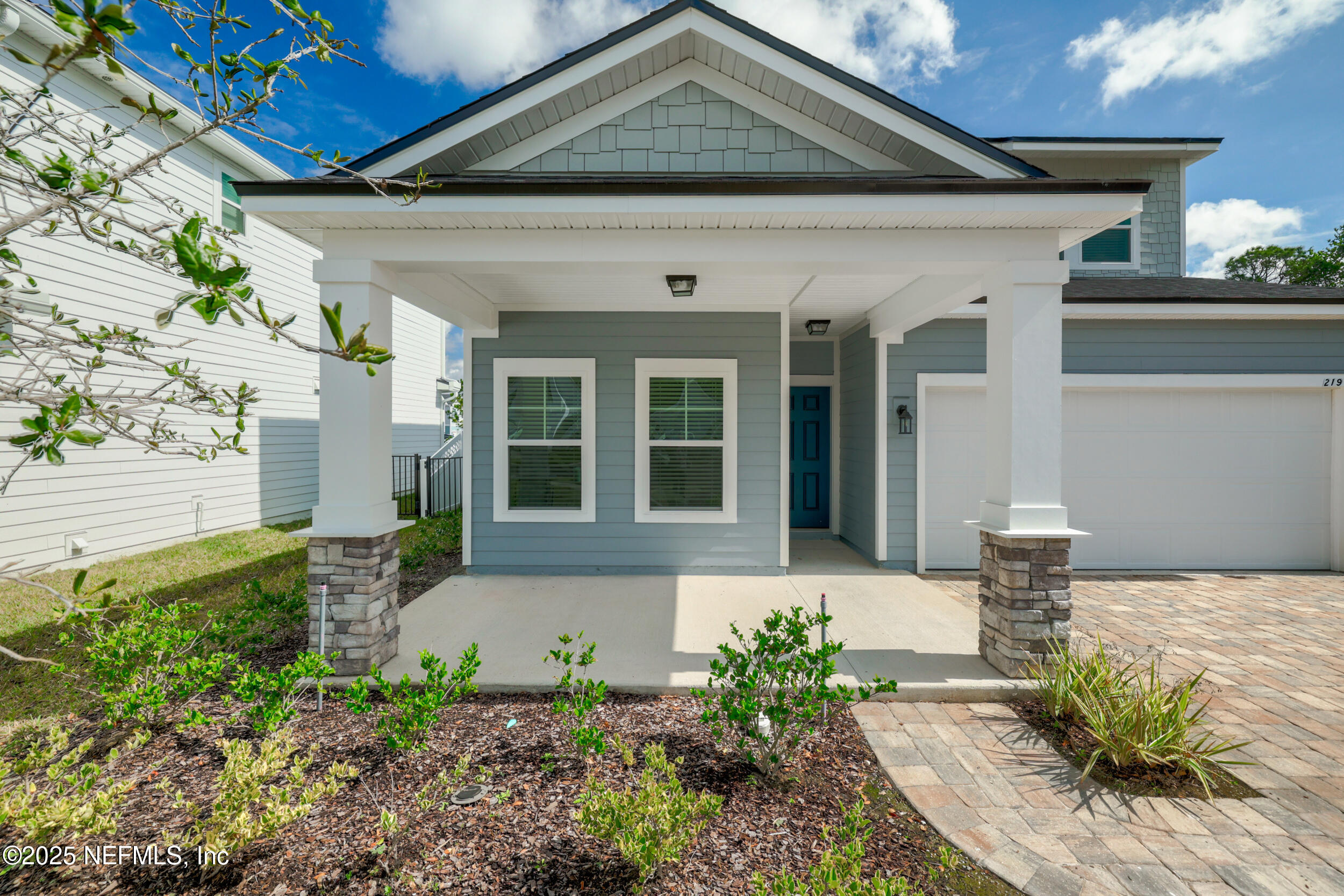 219 Goldcrest Way St. Augustine, FL 32092 - Photo 5 of 55 a front view of a house with garden