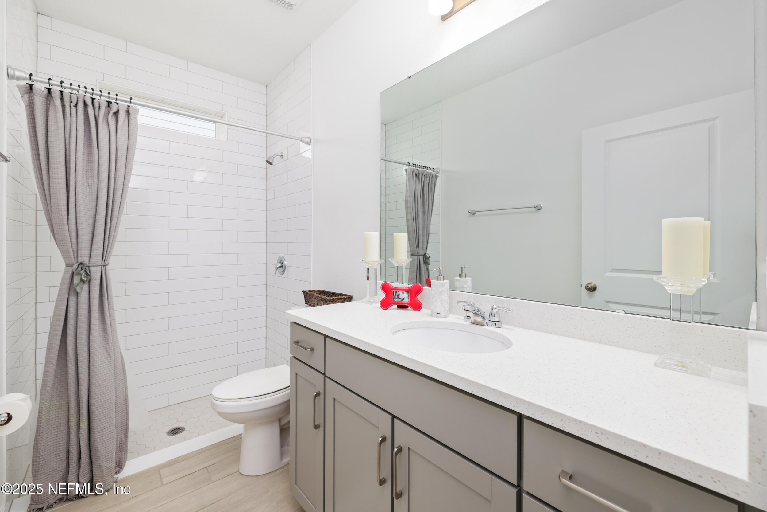 219 Goldcrest Way St. Augustine, FL 32092 - Photo 8 of 55 a bathroom with a sink toilet and shower