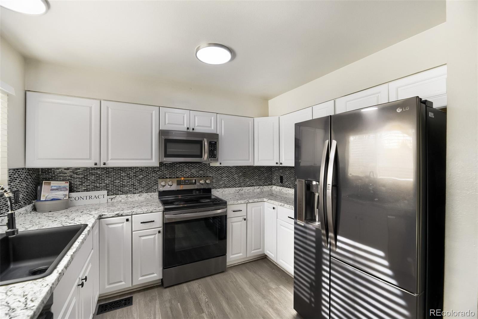 4212 South Laredo Way Aurora, CO 80013 - Photo 6 of 28