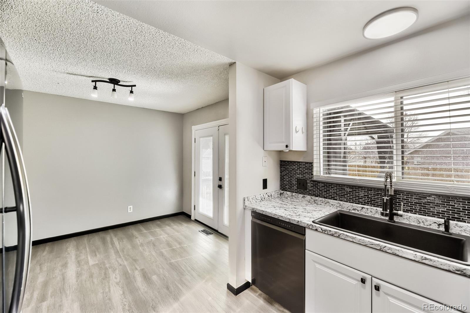 4212 South Laredo Way Aurora, CO 80013 - Photo 7 of 28