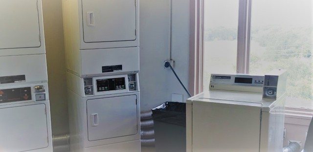 1 Renaissance Place, Unit 719 Palatine, IL 60067 - Photo 11 of 20 a kitchen with a refrigerator and a sink