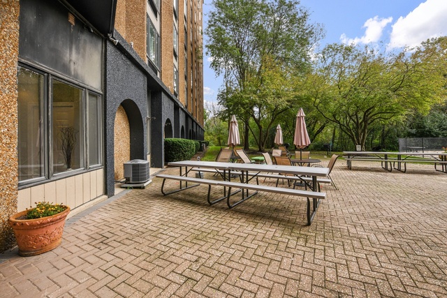1 Renaissance Place, Unit 719 Palatine, IL 60067 - Photo 15 of 20 a view of outdoor space with seating and trees