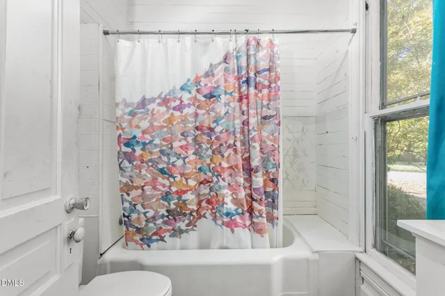 a view of kitchen with furniture and window