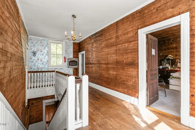 a view of livingroom with furniture and refrigerator