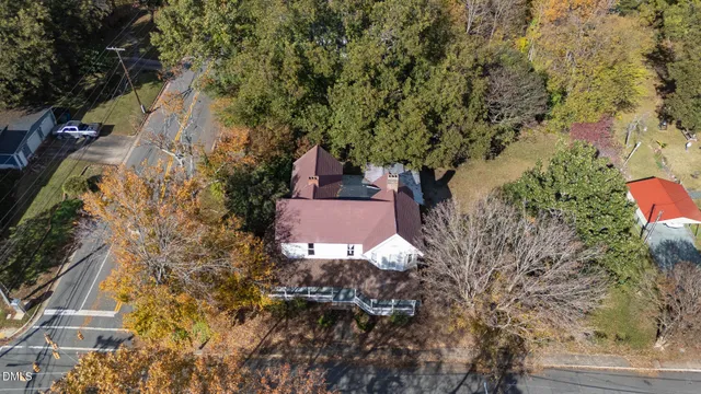 a house with trees in front of it